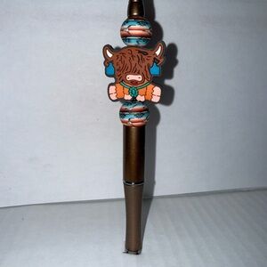 Handmade Beaded- brown highland Cow. Great for home or office use.